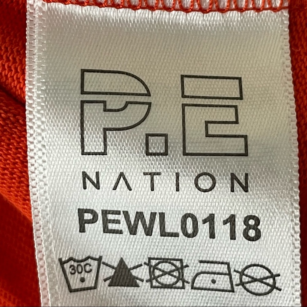 P.E. NATION RED ROCKET 3/4 SLEEVE TUNIC HOCKEY TOP ORANGE WHITE BLACK MEDIUM - Picture 9 of 10